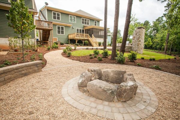 custom stone fire pit with seating