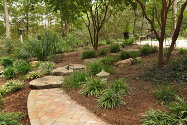 stone walkway with landscape design