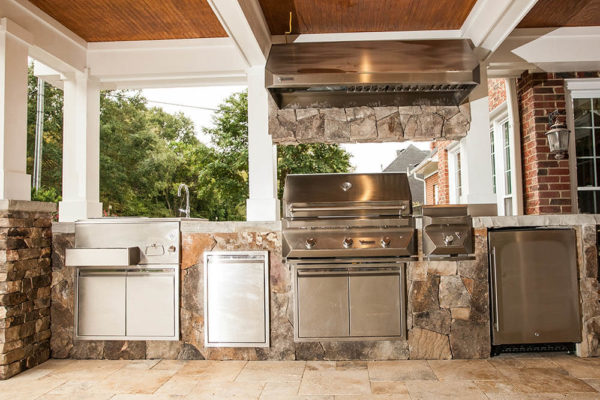 backyard grilling station on stone patio