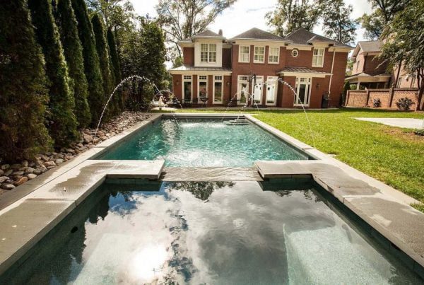 inground pool with water features