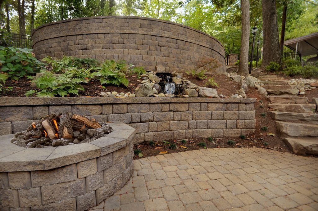 stone retaining wall in backyard