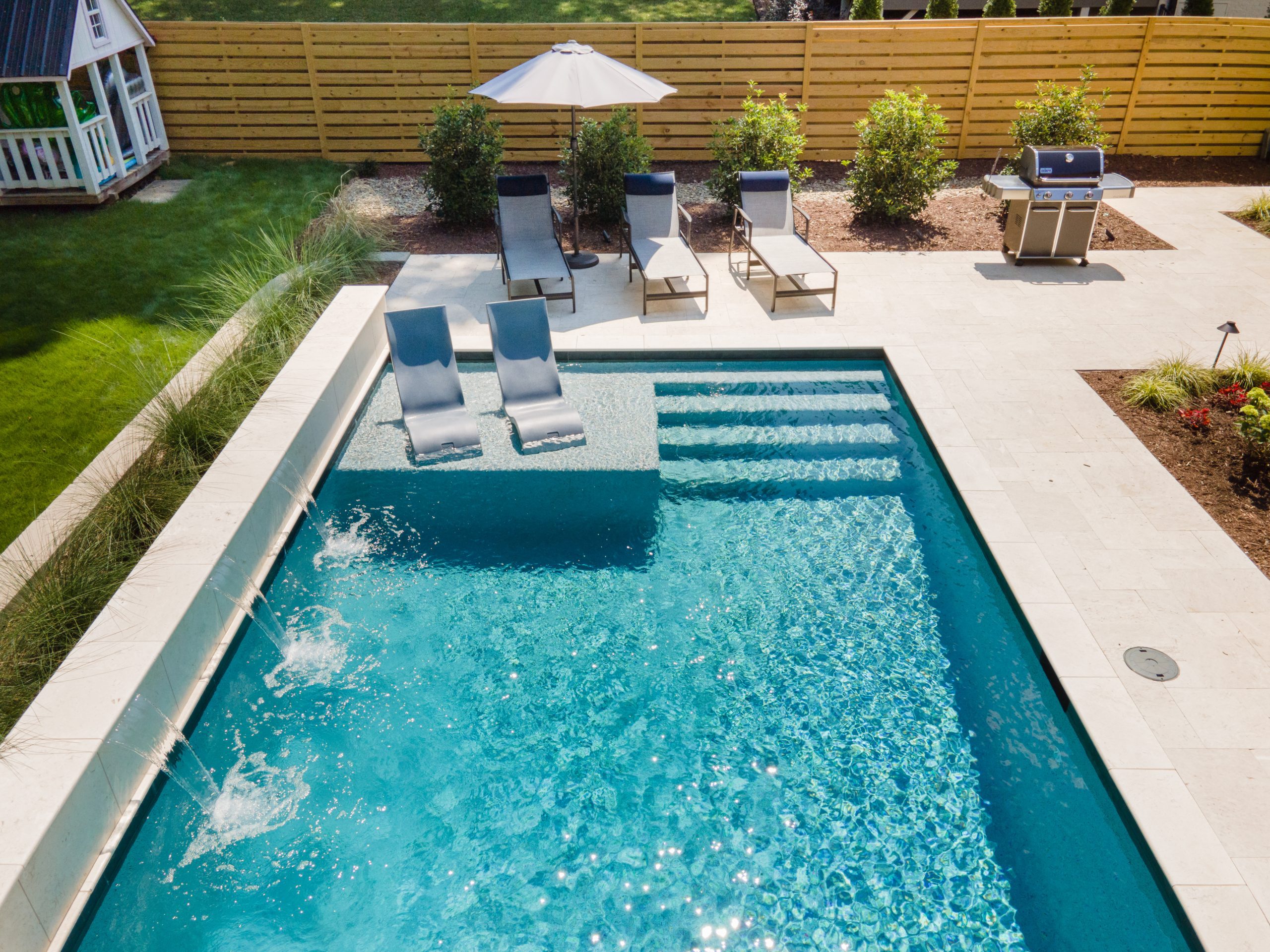 Custom pool with waterfall