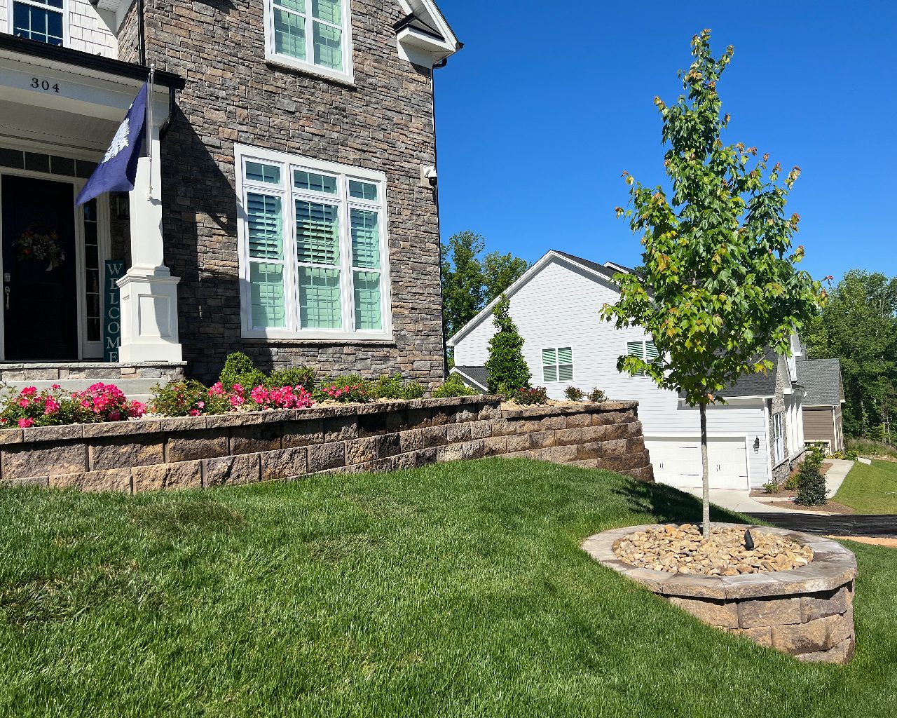 Front yard with retaining walls and landscaping